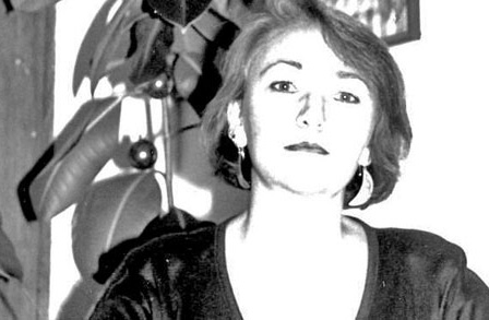 Black and white head shot of poet Grace Bauer.